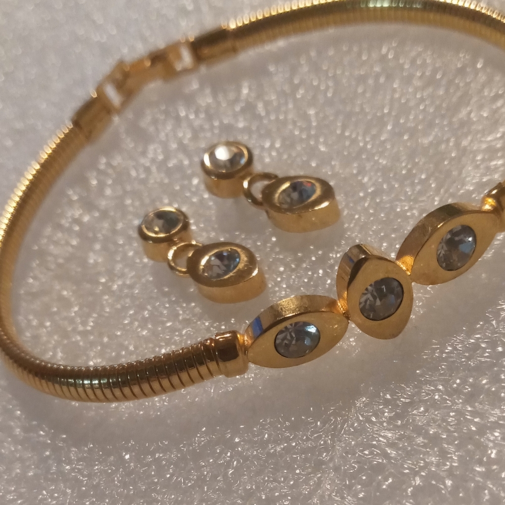 Avon snake chain bracelet with matching earrings multi faceted crystal